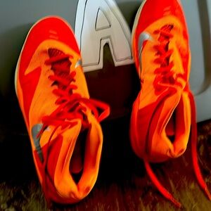 Nike men's 13, orange and silver, slightly used